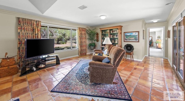 tiled living room featuring visible vents, baseboards, and crown molding