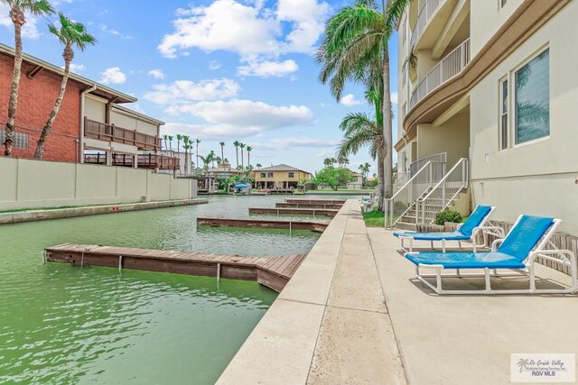 view of dock with a water view