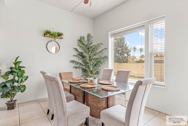 dining space with light tile patterned floors