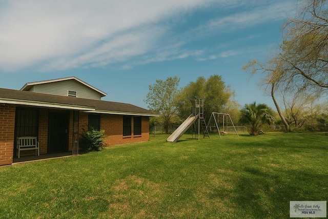 4425 S Oklahoma Ave, Brownsville, TX 78520 - view of yard featuring a playground