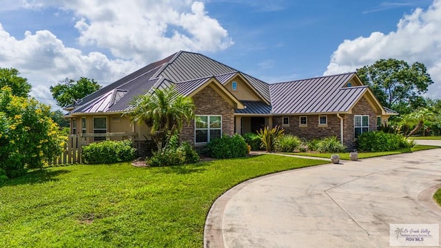 view of front of home with a front yard