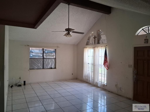 535 Windwood Way, Brownsville, TX 78526 - foyer with a textured ceiling, beam ceiling, healthy amount of natural light, ceiling fan, and light tile patterned floors