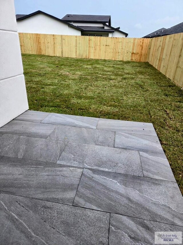 115 Finch Dr, Los Fresnos, TX 78566 - view of yard with a patio area