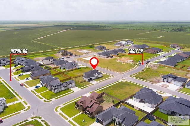 115 Finch Dr, Los Fresnos, TX 78566 - aerial view of property and surrounding area with nearby suburban area