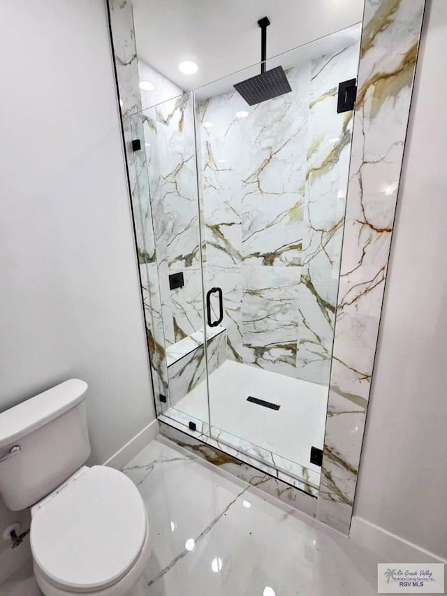 115 Finch Dr, Los Fresnos, TX 78566 - bathroom featuring marble tiled flooring and a marble finish shower