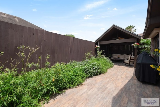 1675 Chipinque Dr, Brownsville, TX 78526 - view of patio featuring an outdoor living space, a fenced backyard, and ceiling fan