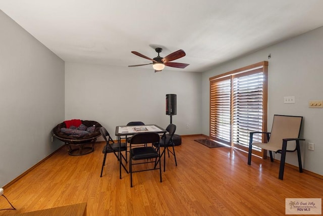 1675 Chipinque Dr, Brownsville, TX 78526 - dining area with light wood-style floors, ceiling fan, and baseboards