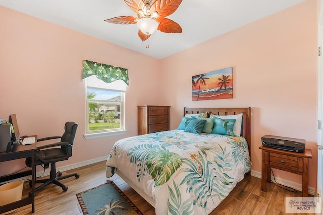 bedroom featuring ceiling fan and hardwood / wood-style floors