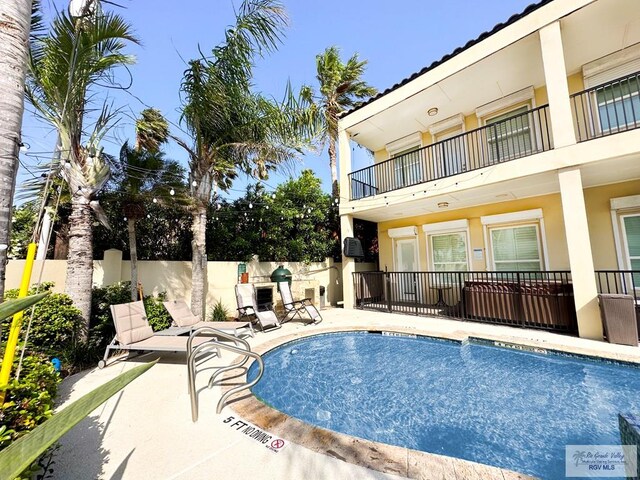 107 E Palm St Unit B, South Padre Island, TX 78597 - view of pool featuring a patio area