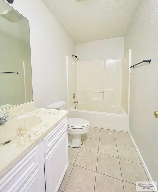 full bathroom with tile patterned flooring, a textured ceiling, toilet, vanity, and shower / bathtub combination