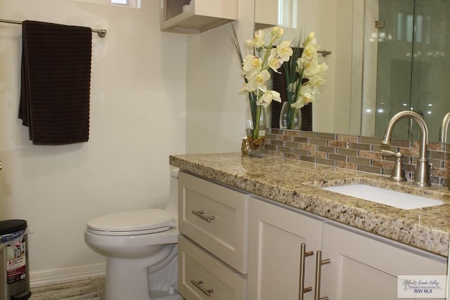 3512 Westcreek Dr, Brownsville, TX 78526 - full bath with vanity, a stall shower, and backsplash