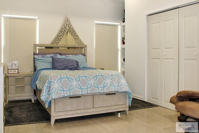 3512 Westcreek Dr, Brownsville, TX 78526 - bedroom featuring a closet and wood finished floors