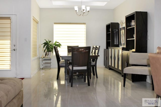 3512 Westcreek Dr, Brownsville, TX 78526 - dining room featuring a chandelier and light tile patterned floors