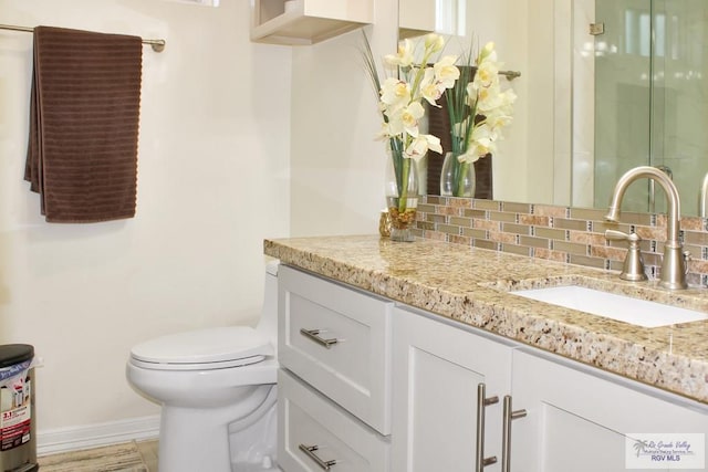 3512 Westcreek Dr, Brownsville, TX 78526 - bathroom with vanity, a stall shower, and decorative backsplash