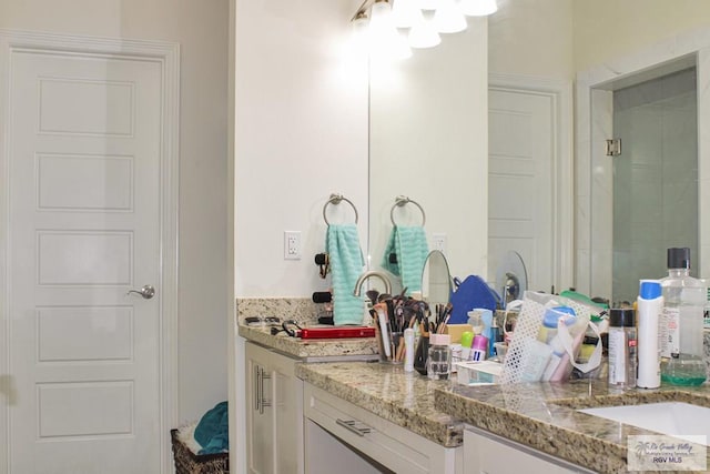 3512 Westcreek Dr, Brownsville, TX 78526 - bathroom featuring vanity and a chandelier
