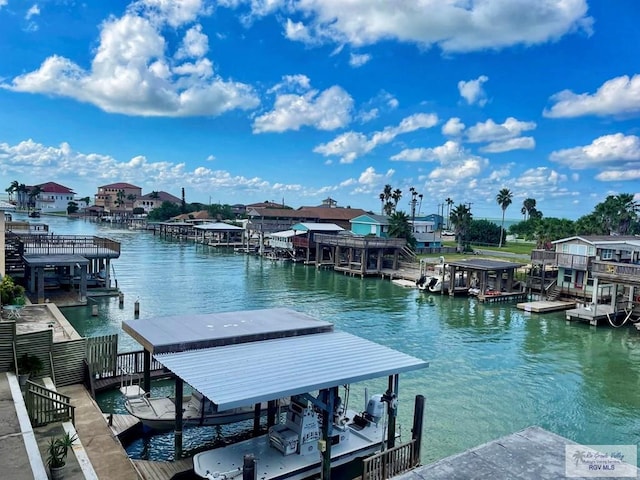 dock area featuring a water view