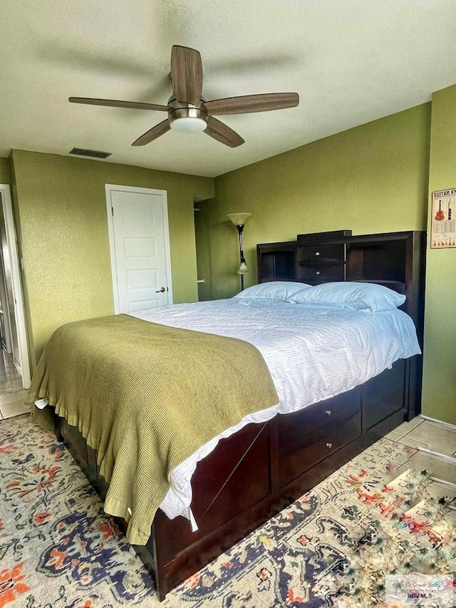 bedroom featuring ceiling fan