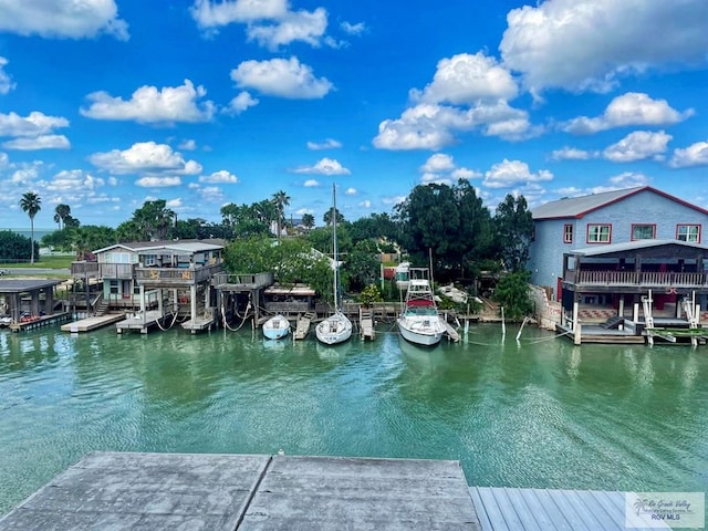 dock area featuring a water view