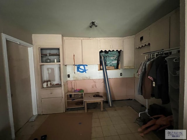 kitchen with white cabinets