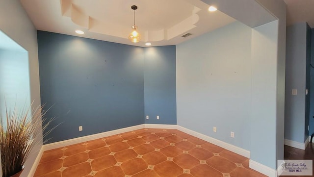3429 E Country Club Dr, Edinburg, TX 78542 - spare room featuring baseboards, visible vents, recessed lighting, and a raised ceiling