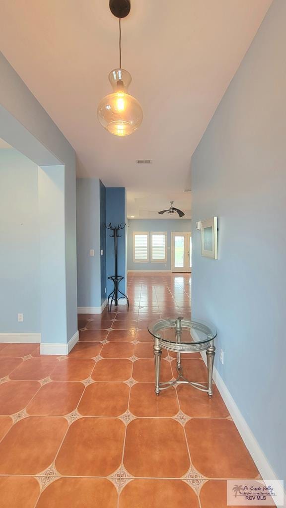 3429 E Country Club Dr, Edinburg, TX 78542 - hallway with baseboards