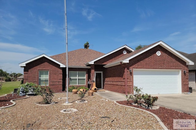 3429 E Country Club Dr, Edinburg, TX 78542 - ranch-style house featuring concrete driveway, brick siding, roof with shingles, and a garage