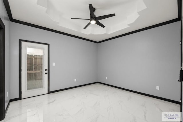 6948 Wild Olive Ln, Brownsville, TX 78526 - unfurnished room with a tray ceiling, ceiling fan, and ornamental molding