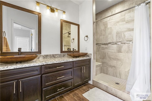 bathroom featuring vanity and a shower with curtain