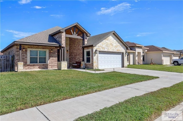 view of front facade with a front yard and a garage