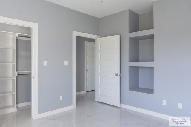 unfurnished bedroom featuring a closet