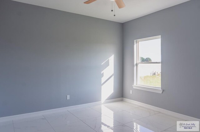 empty room featuring ceiling fan