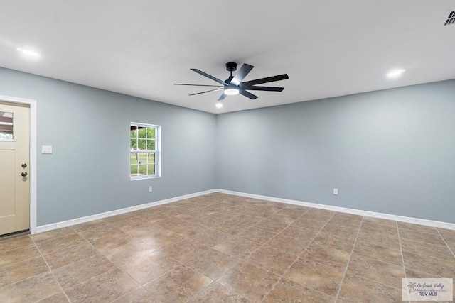 27859 Mile 3, La Feria, TX 78559 - spare room with a ceiling fan, baseboards, and recessed lighting