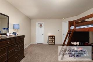 bedroom featuring light carpet