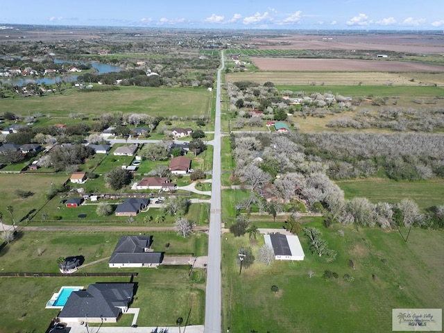 aerial view featuring a rural view and a water view