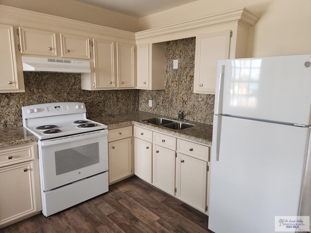 kitchen with decorative backsplash, white appliances, dark wood-type flooring, sink, and stone counters