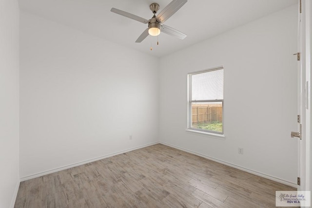 unfurnished room with ceiling fan and light hardwood / wood-style floors