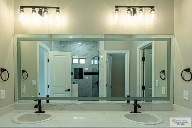 8801 Swan Lake Dr # 24, Harlingen, TX 78552 - bathroom with vanity and a marble finish shower