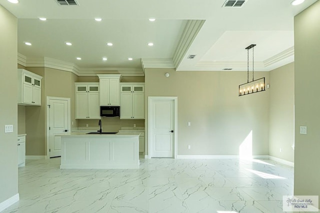8801 Swan Lake Dr # 24, Harlingen, TX 78552 - kitchen featuring black microwave, marble finish floor, open floor plan, and baseboards