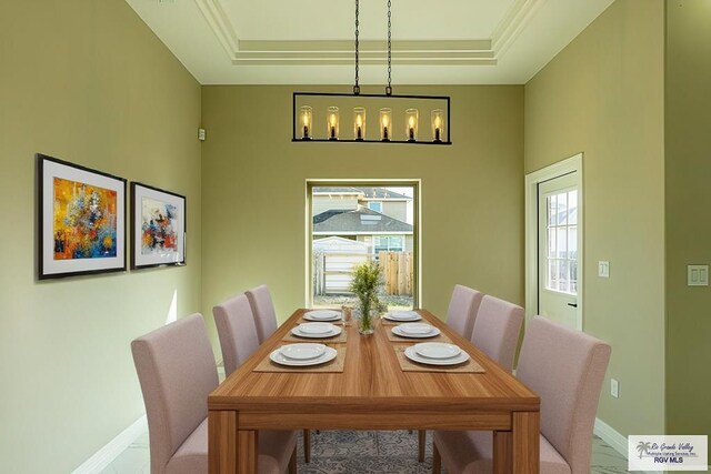8801 Swan Lake Dr # 24, Harlingen, TX 78552 - dining room with a raised ceiling and baseboards