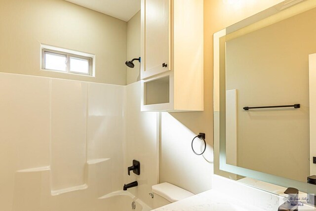 8801 Swan Lake Dr # 24, Harlingen, TX 78552 - full bathroom featuring toilet, washtub / shower combination, and vanity
