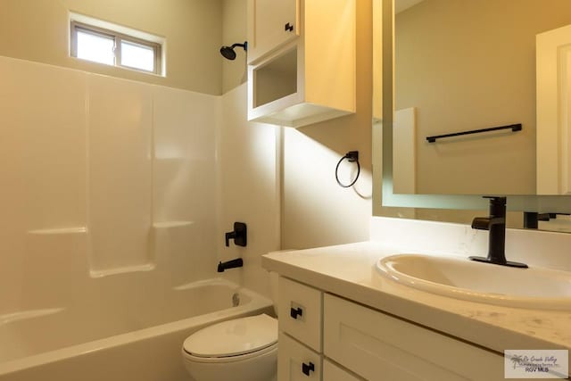 8801 Swan Lake Dr # 24, Harlingen, TX 78552 - bathroom featuring toilet, bathtub / shower combination, and vanity