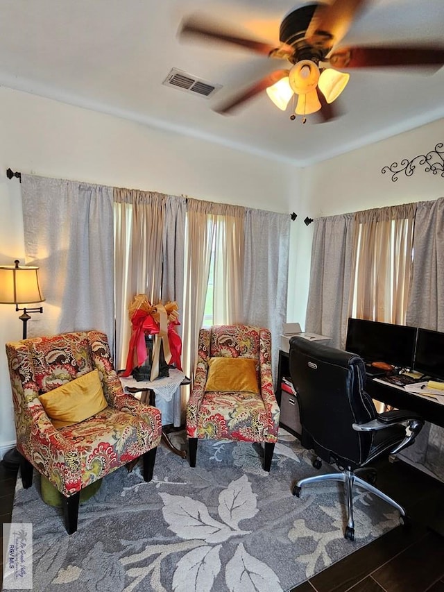 home office featuring hardwood / wood-style flooring and ceiling fan