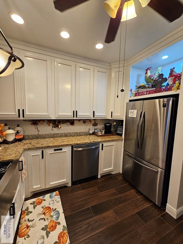 kitchen featuring white cabinets, dark hardwood / wood-style floors, and appliances with stainless steel finishes