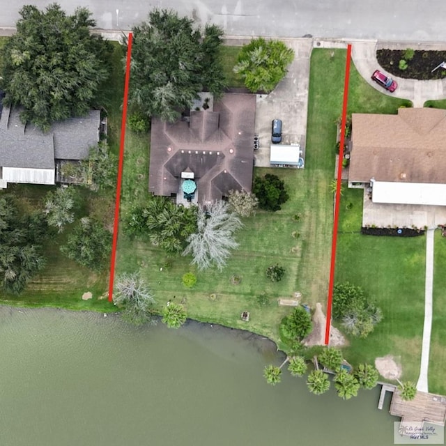 birds eye view of property featuring a water view