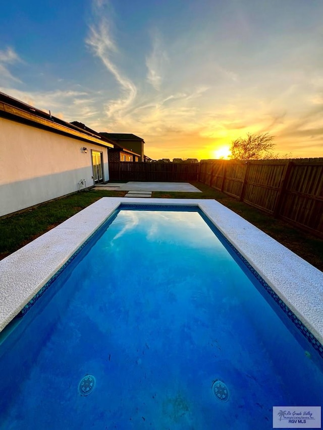 406 Valle Alto Dr, Los Fresnos, TX 78566 - view of swimming pool featuring a fenced backyard