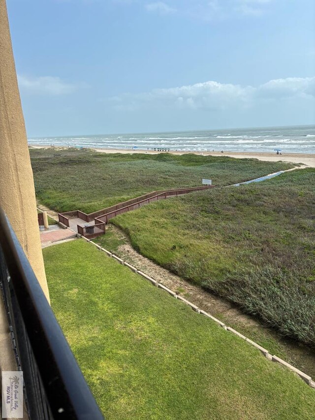 110 Padre Blvd Unit 407, South Padre Island, TX 78597 - view of yard with a beach view, a water view, and a balcony