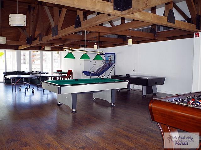 200 Padre Blvd Unit A314 1314, South Padre Island, TX 78597 - rec room with billiards and wood finished floors
