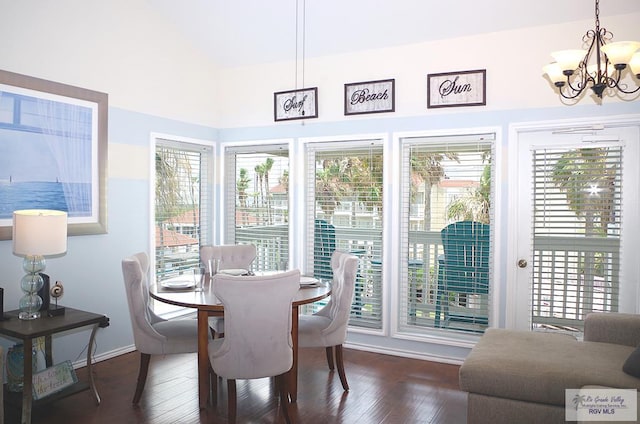 200 Padre Blvd Unit A314 1314, South Padre Island, TX 78597 - dining room with a chandelier, hardwood / wood-style floors, and lofted ceiling