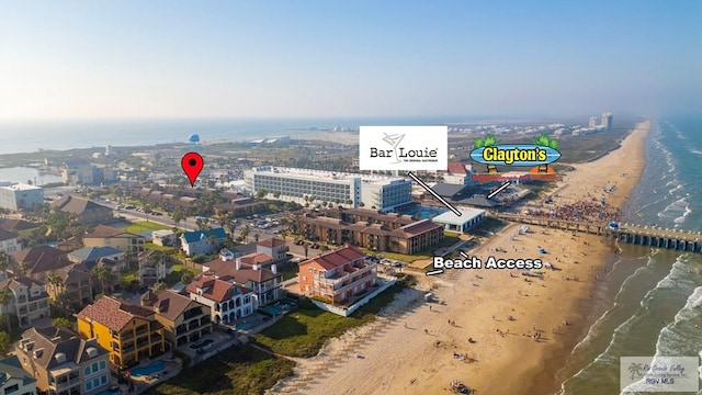 aerial view featuring a water view and a view of the beach