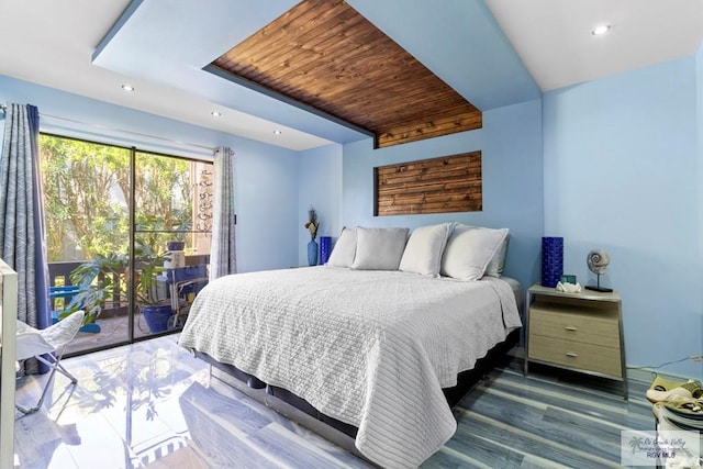 bedroom featuring recessed lighting, access to exterior, wood finished floors, and wood ceiling